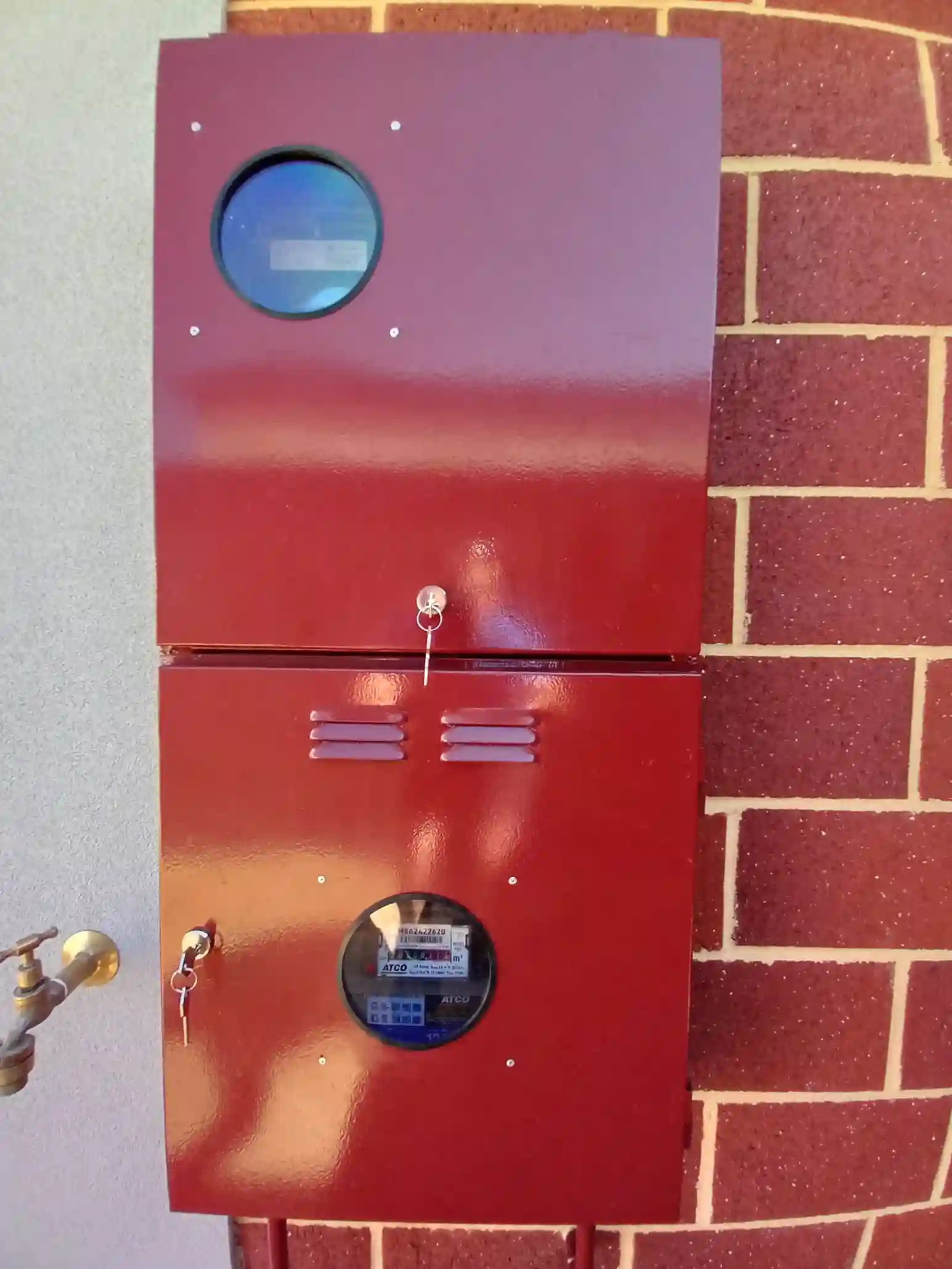 Double meter box with two WAS-approved locks and viewing windows installed in Perth
